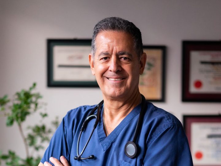 A doctor caring for a patient and their family